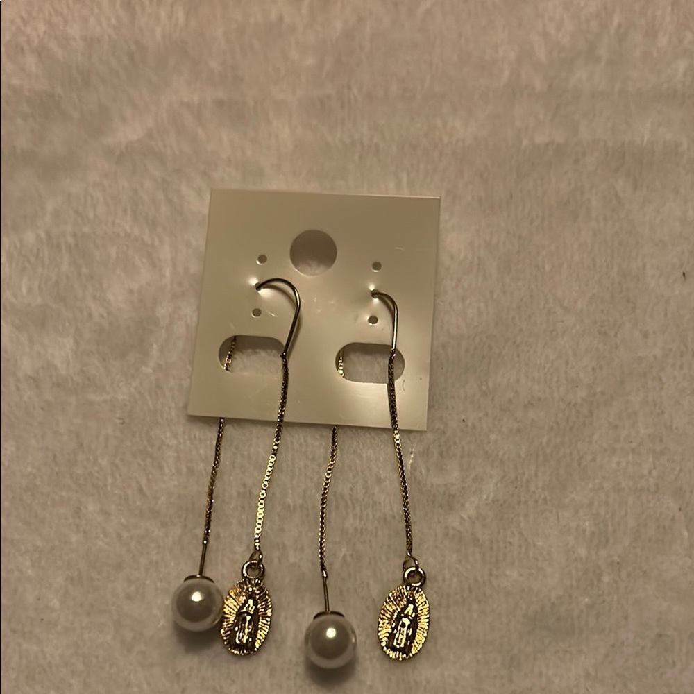 Gold and White Dangle Earrings with Textured Pendants